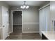 Dining area with wood-look flooring, chandelier, and entry to another room at 1654 Tree Line Rd, Lithonia, GA 30058