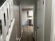 The entryway features stairs and opens to a hallway leading to the kitchen at 1654 Tree Line Rd, Lithonia, GA 30058