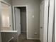 Hallway with several doors leading to different rooms at 1654 Tree Line Rd, Lithonia, GA 30058
