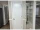 Kitchen pantry and built-in glass shelves at 1654 Tree Line Rd, Lithonia, GA 30058