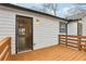 Back deck with access to living area at 1358 To Lani Farm Rd, Stone Mountain, GA 30083