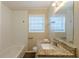 Clean bathroom with granite countertop and bathtub at 4731 Kings Hwy, Douglasville, GA 30135