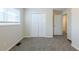 Simple bedroom with closet and carpet flooring at 4731 Kings Hwy, Douglasville, GA 30135