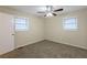 Spacious bedroom with neutral walls and carpet at 4731 Kings Hwy, Douglasville, GA 30135