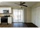 Dining area with sliding glass doors to deck and ceiling fan at 4731 Kings Hwy, Douglasville, GA 30135