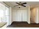 Bright dining area with hardwood floors, sliding glass doors and built-in storage at 4731 Kings Hwy, Douglasville, GA 30135
