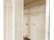 Laundry closet with shelving and hookups at 4731 Kings Hwy, Douglasville, GA 30135