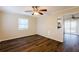 Living room with hardwood floors and access to kitchen and dining area at 4731 Kings Hwy, Douglasville, GA 30135