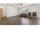 Spacious living room featuring hardwood floors and a neutral color palette at 733 Millwood Dr, Dacula, GA 30019