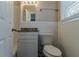 Clean bathroom featuring granite countertop and updated vanity at 2329 Meadowlane Sw Dr, Atlanta, GA 30311