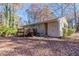 Rear view of ranch house showing deck and storage area at 2329 Meadowlane Sw Dr, Atlanta, GA 30311