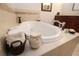 Oval jetted bathtub in a luxurious bathroom setting at 351 Washington Ne Ave # 208, Marietta, GA 30060