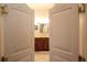 Elegant bathroom with double sinks, a soaking tub, and a walk-in shower at 351 Washington Ne Ave # 208, Marietta, GA 30060