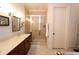 Bathroom with double vanity, walk-in shower, and elegant fixtures at 351 Washington Ne Ave # 208, Marietta, GA 30060