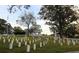 Cemetery with white headstones, gazebo, and large trees at 351 Washington Ne Ave # 208, Marietta, GA 30060