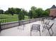 Deck with cemetery view and metal furniture at 351 Washington Ne Ave # 208, Marietta, GA 30060