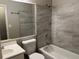 Updated bathroom with new bathtub and tile at 6268 Marbut Farms Trl, Lithonia, GA 30058