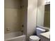 Bathroom with shower/tub combo and updated vanity at 6268 Marbut Farms Trl, Lithonia, GA 30058