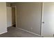 Bedroom with two closets and access to hallway at 6268 Marbut Farms Trl, Lithonia, GA 30058