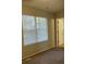 Bright bedroom with large window and ceiling fan at 6268 Marbut Farms Trl, Lithonia, GA 30058