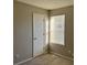Bedroom with closet and window, neutral decor at 6268 Marbut Farms Trl, Lithonia, GA 30058