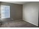 Simple bedroom with large window and closet at 6268 Marbut Farms Trl, Lithonia, GA 30058