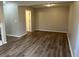Neutral-toned dining room with laminate flooring at 6268 Marbut Farms Trl, Lithonia, GA 30058