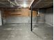Unfinished two-car garage with concrete floor at 6268 Marbut Farms Trl, Lithonia, GA 30058