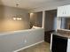 Kitchen with breakfast bar and view into living room at 6268 Marbut Farms Trl, Lithonia, GA 30058