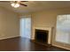 Living room featuring a fireplace, sliding doors, and dark hardwood floors at 6268 Marbut Farms Trl, Lithonia, GA 30058