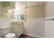 Basement bathroom with granite vanity and wainscoting at 2836 Hedgewood Nw Dr, Atlanta, GA 30311