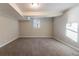 Finished basement bedroom with neutral decor and carpet at 2836 Hedgewood Nw Dr, Atlanta, GA 30311