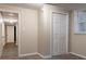 Basement bedroom with built-in closet and carpet flooring at 2836 Hedgewood Nw Dr, Atlanta, GA 30311