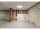 Unfinished basement with laundry hookups and ample storage space at 2836 Hedgewood Nw Dr, Atlanta, GA 30311