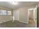 Bright bedroom with ample closet space and carpet flooring at 2836 Hedgewood Nw Dr, Atlanta, GA 30311
