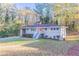 Ranch house with a red door and large yard at 2836 Hedgewood Nw Dr, Atlanta, GA 30311