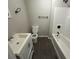 Clean bathroom with a white vanity and tub at 4887 Glenwood Rd, Decatur, GA 30035