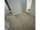 Simple bedroom with neutral carpet and ample space at 4887 Glenwood Rd, Decatur, GA 30035