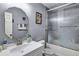 Clean bathroom with a shower/tub combo and white vanity at 9224 Snipe Ln, Jonesboro, GA 30236