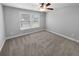 Simple bedroom with neutral walls and carpeted floor at 422 Mcdaniel Pl, Canton, GA 30115