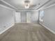 Large bedroom with ceiling fan and neutral decor at 422 Mcdaniel Pl, Canton, GA 30115