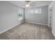 Charming bedroom with a window and ceiling fan at 422 Mcdaniel Pl, Canton, GA 30115