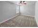 Bright bedroom with ceiling fan and window at 422 Mcdaniel Pl, Canton, GA 30115