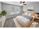 Virtually staged bedroom with light grey walls and carpet flooring at 422 Mcdaniel Pl, Canton, GA 30115
