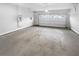 Spacious two-car garage with concrete floor at 422 Mcdaniel Pl, Canton, GA 30115