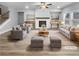 Virtually staged living room with fireplace, hardwood floors, and neutral decor at 422 Mcdaniel Pl, Canton, GA 30115