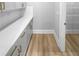 Walk-in pantry with ample shelving and white cabinets at 422 Mcdaniel Pl, Canton, GA 30115