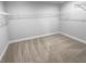 Ample walk-in closet with wire shelving at 422 Mcdaniel Pl, Canton, GA 30115