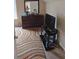 Bedroom with dresser, TV stand and colorful rug at 2513 Colin Pl, Mcdonough, GA 30253
