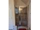 Bathroom with a sliding glass shower door at 2513 Colin Pl, Mcdonough, GA 30253